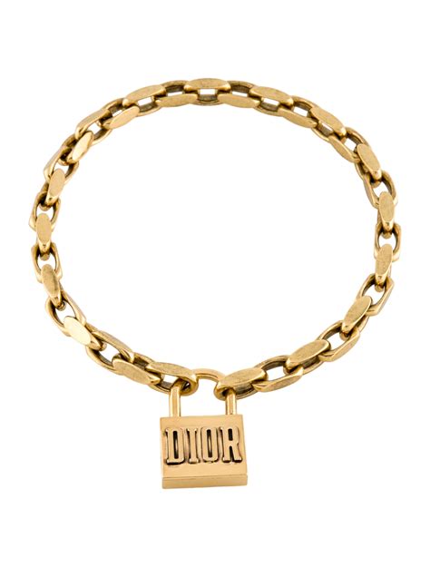 dior lucky locket necklace in aged gold tone metal price|Christian Dior Aged Gold Finish Lucky Locket Choker Necklace.